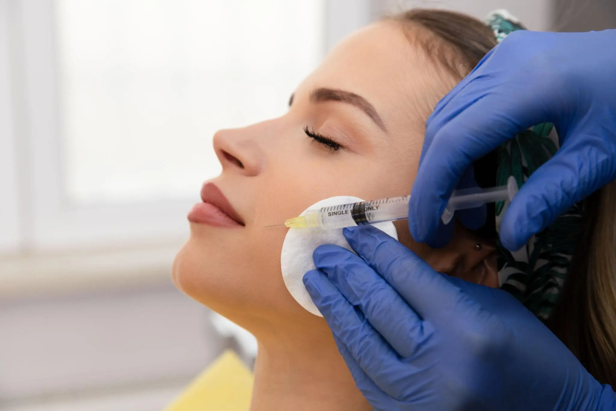 Elegant profile portrait showing natural facial balance and contour
