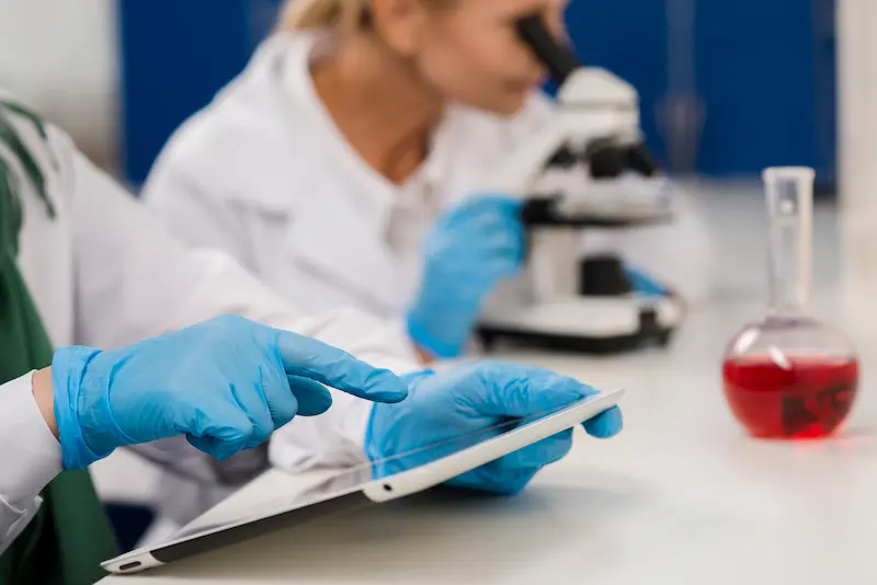Medical laboratory team reviewing test results for a weight loss evaluation